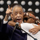 The Rev. Al Sharpton hugs Stevante Clark while speaking during the funeral services for police shooting victim Stephon Clark at Bayside of South Sacramento Church in Sacramento, Calif., on March 29, 2018.